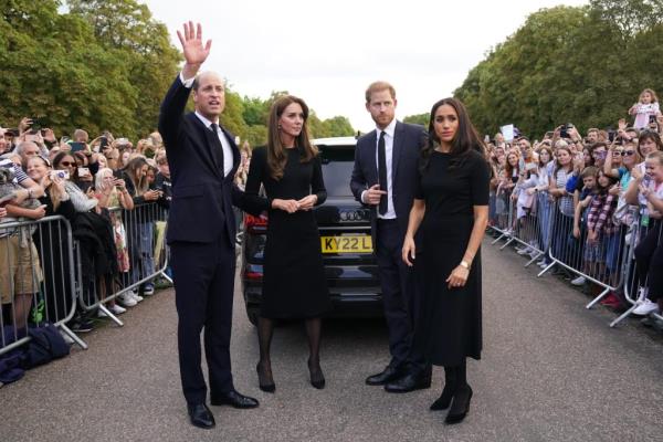 Catherine, Princess of Wales, Prince William, Prince of Wales, Prince Harry, Duke of Sussex, and Meghan, Duchess of Sussex meet members of the public on the long Walk at Windsor Castle.