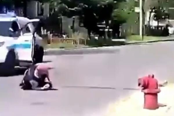 Chicago Police Officer Edward Poppish was dragged as Temple backed up until the cop broke away from the vehicle.