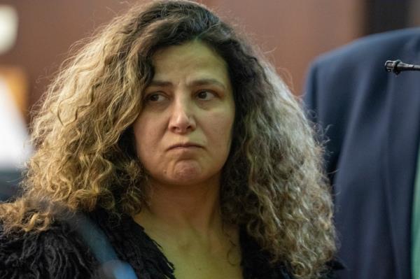 Albanni frowning in court