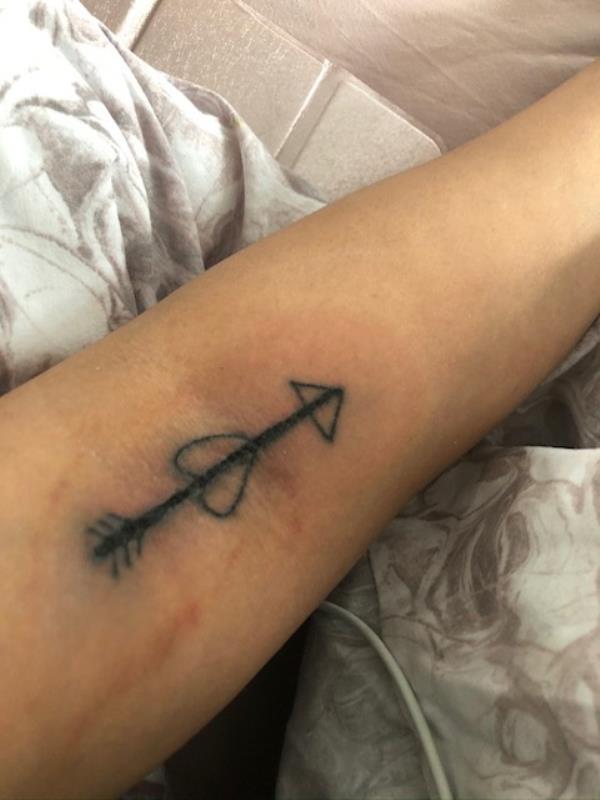 Natalie's tattoo resembling a 