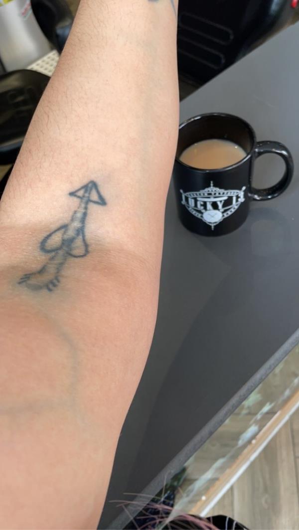 Natalie's tattoo resembling a 