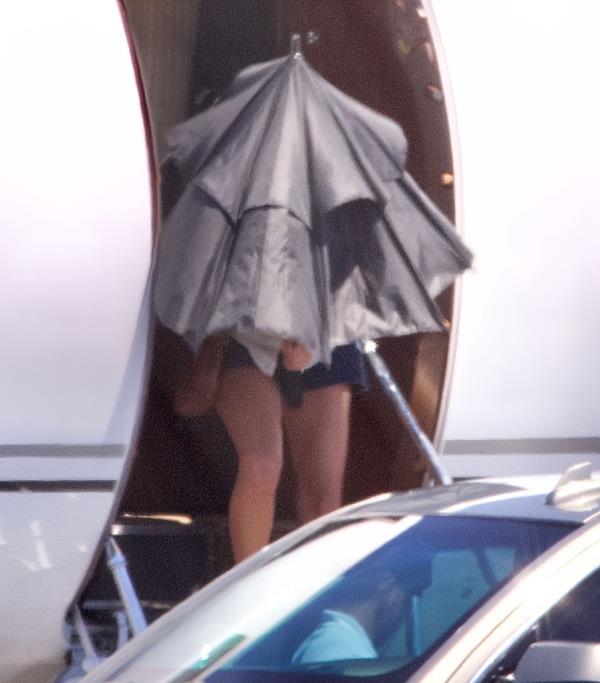 Taylor Swift was voted the worst celebrity in carbon emissions due to private jet use. These unseen pictures show that Taylor Swift goes out her way to try and hide her private jet use on July 5, 2022. 