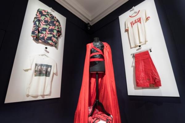 LONDON, UNITED KINGDOM - AUGUST 03: Freddie Mercury's costumes including a 'FLASH' t-shirt with matching vinyl trousers (R) (estimate 15,000-20,000) are displayed during a photocall at Sotheby's auction house for the unveiling of Freddie Mercury's entire private collection ahead of an exhibition and six dedicated sales in London, United Kingdom on August 03, 2023. 'Freddie Mercury: A World of His Own' exhibition starring stage costumes, handwritten lyrics, fine and decorative arts, Japanese art, precious objects and a trove of perso<em></em>nal belo<em></em>ngings will be open to the public between August 4th and September 5th, before the items are offered across six dedicated auctions, each one devoted to a different aspect of Mercurys life, both public and private. (Photo by Wiktor Szymanowicz/Anadolu Agency via Getty Images)