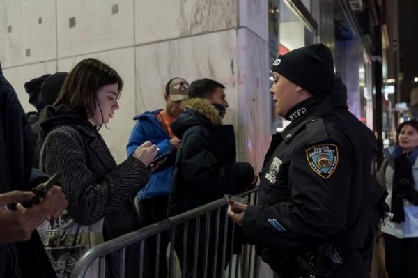 Police barricades on New Year's Eve in Times Square with NYPD officers. Photo by Stefano Giovannini.