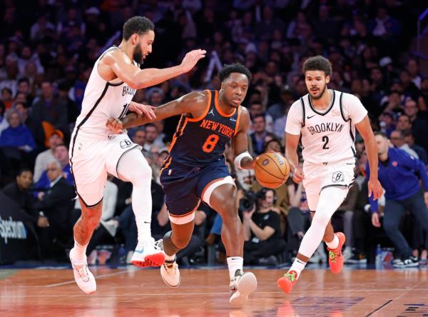 New York Knicks forward OG Anunoby drives down court as Brooklyn Nets guard Ben Simmons defends in the first half at the Madison Square Garden in New York, USA, Friday, November 15, 2024. 