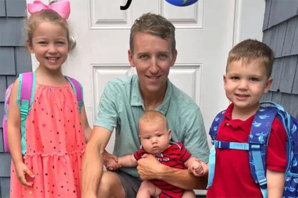 Patrick Clancy with his three children. 