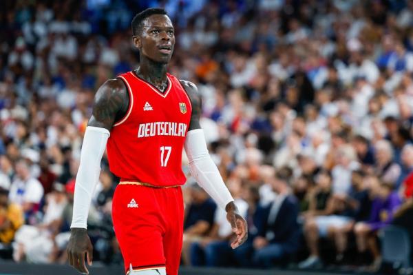 Dennis Schroder of Germany in a basketball uniform looking on during the Men's Semifinal Basketball match between France and Germany at the Paris 2024 Olympics