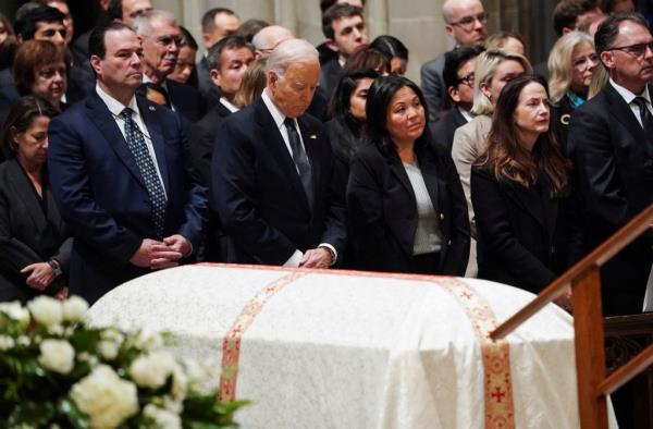 Biden bows his head before the casket of retired U.S. Supreme Court Justice Sandra Day O'Connor.