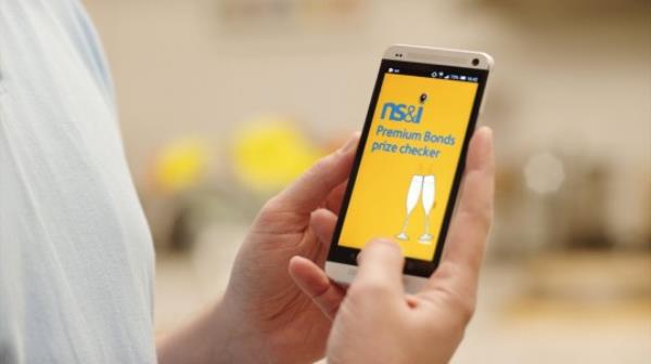 Handout photo issued by NS&I of their prize checker app on a phone, as premium bo<em></em>nds celebrate their 60th birthday on 1 November 2016. 