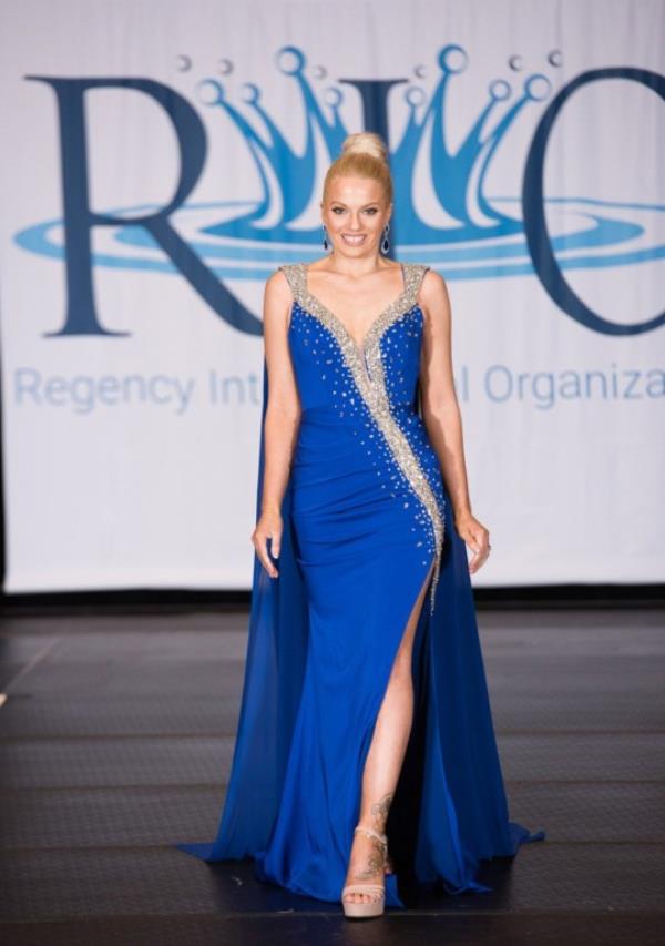 Jessica in a blue ballgown 