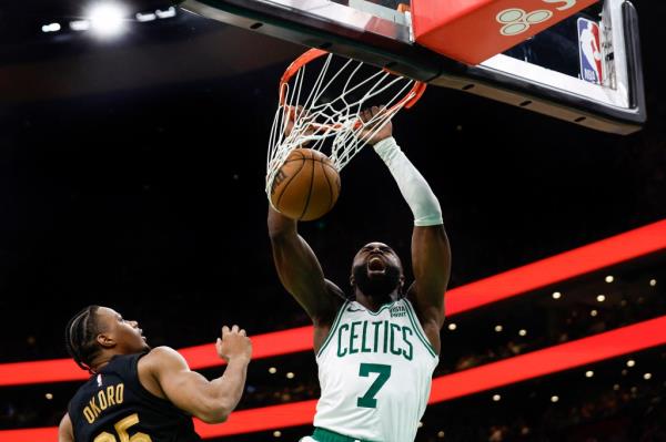Jaylen Brown, who scored 32 points, slams home a dunk during the Celtics' 120-95 win over the Cavaliers in Game 1.