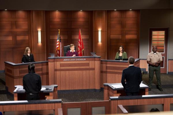 Sarah Rose sits next to her grandmother Judge Judy Sheindlin in a courtroom. 