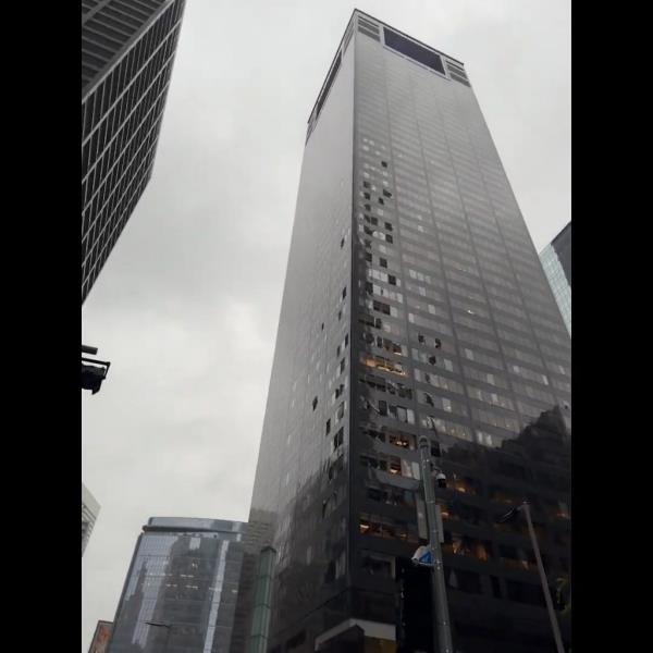 A view of damaged windows of a building following a storm in Houston, Texas on May 16, 2024.