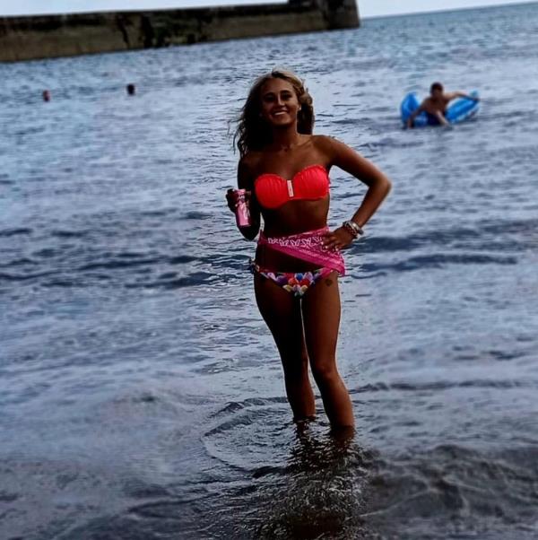 Megan Blain, 18, a student from the UK, obsessed with tanning in sun beds. 
