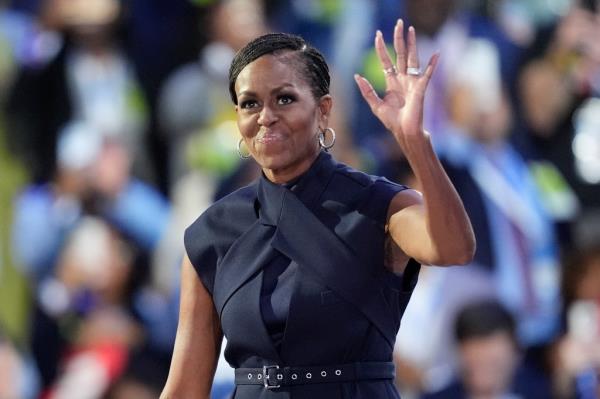 In a clarion call to Democrats, the former first lady urged the crowd to 