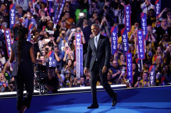 She later wrapped up her speech and welcomed former President Barack Obama to the stage. 