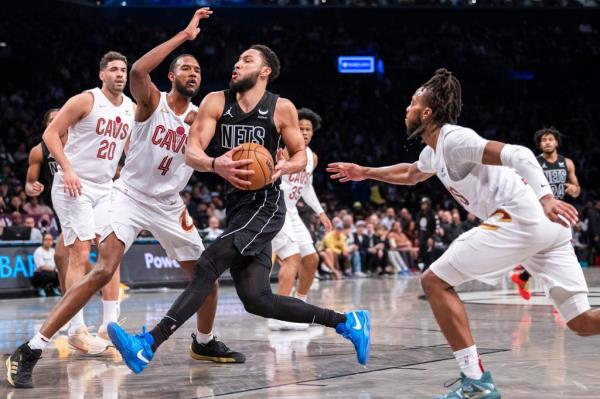 Ben Simmons drives toward the basket during a Nets game against the Cavaliers on Feb. 8.