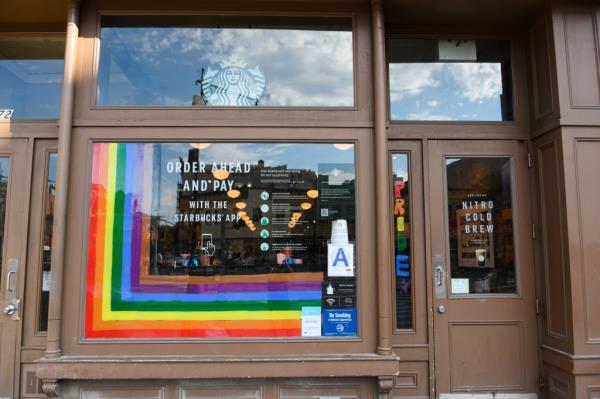 A Starbucks outpost in Manhattan is seen with pro-Pride rainbow decorations. The Seattle-ba<em></em>sed coffee chain has historically been very public with its pro-LGBTQ+ beliefs.