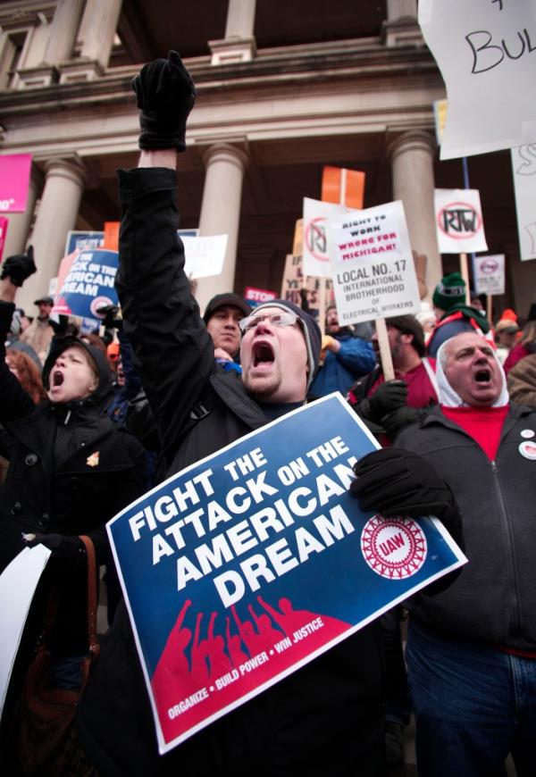 Craig Cable and United Auto Workers Unio<em></em>n members protesting Right-To-Work legislation at Michigan State Capitol, 2012
