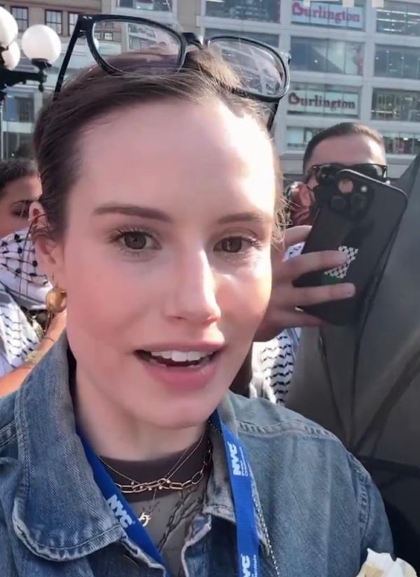 Olivia Reingold, of The Free Press, took footage of her being encircled by demo<em></em>nstrators who wanted her to leave the area.