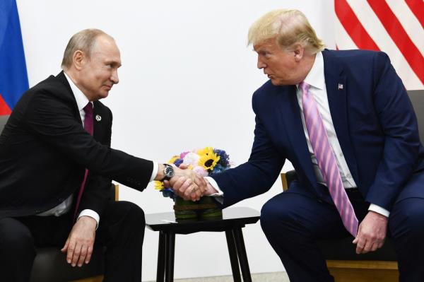 Vladimir Putin and Do<em></em>nald Trump at the G20 summit on June 28, 2019.