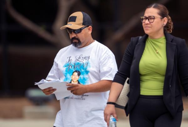 Francisco Rodriguez wearing a T-shirt with an image of his son Javier — who was killed in the shooting — outside of federal court.