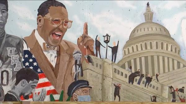 A 2,500 sq ft mural along Manhattan Ave underpass of I-287. An image of Louis Farrakhan will be painted over for making anti-Semitic remarks.