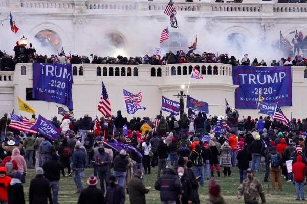 violent rioters supporting President Do<em></em>nald Trump, storm the Capitol in Washington.