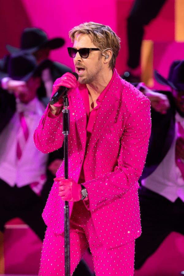 Ryan Gosling in a pink suit singing 'I'm Just Ken' at the 96th Oscars at the Dolby Theatre.