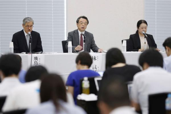 Lawyer and former prosecutor Makoto Hayashi, center, speaks during a news co<em></em>nference in Tokyo Tuesday, Aug. 29, 2023.