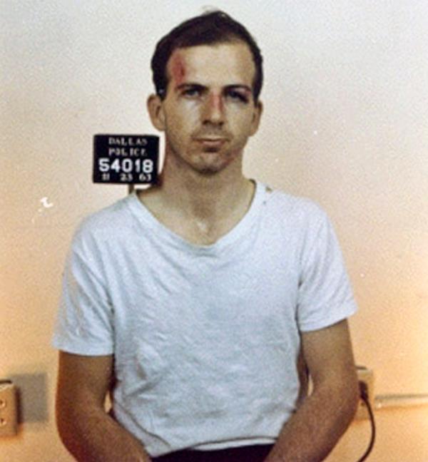 in a mug shot after he was arrested for assassinating President John F Kennedy in Dallas