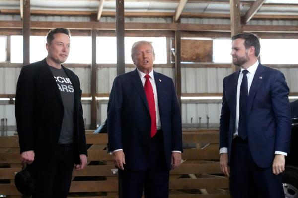 Tesla and SpaceX CEO Elon Musk, from left, Republican presidential nominee former President Do<em></em>nald Trump and Republican vice presidential nominee Sen. JD Vance, R-Ohio,
