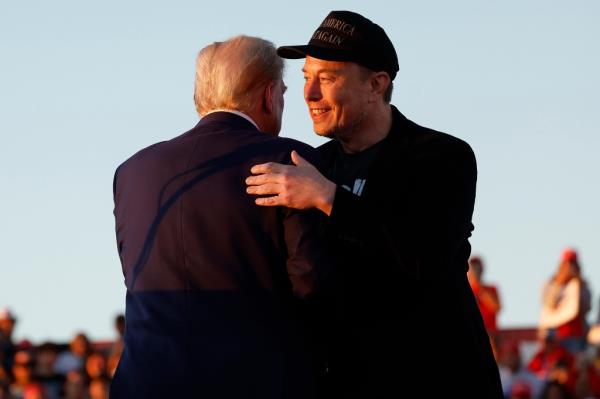 Elon Musk and TRump ebrace