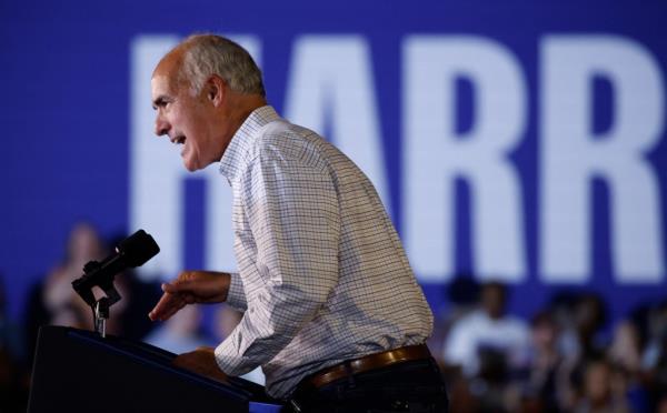 US Senator Bob Casey Jr. speaking at a campaign event with Vice President Kamala Harris at Wilkes University's McHale Athletic Center