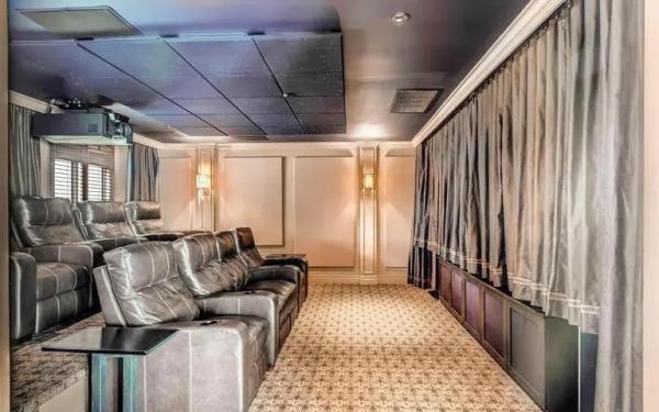 The movie theater — one of many amenities in the home. 