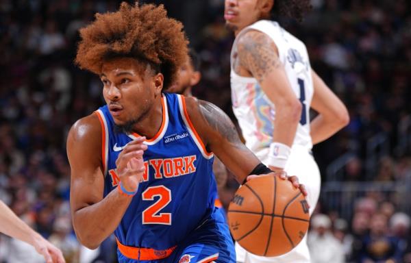Miles McBride drives to the basket during the Knicks' win over the Nuggets. 
