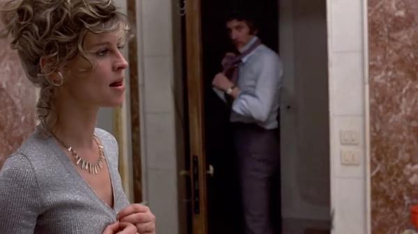 Julie Christie and Do<em></em>nald Sutherland getting dressed