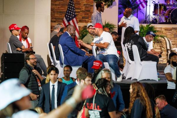 Trump supporters sitting in chairs during a Black Americans for Trump roundtable at 180 Church in Detroit, Michigan on June 15, 2024.