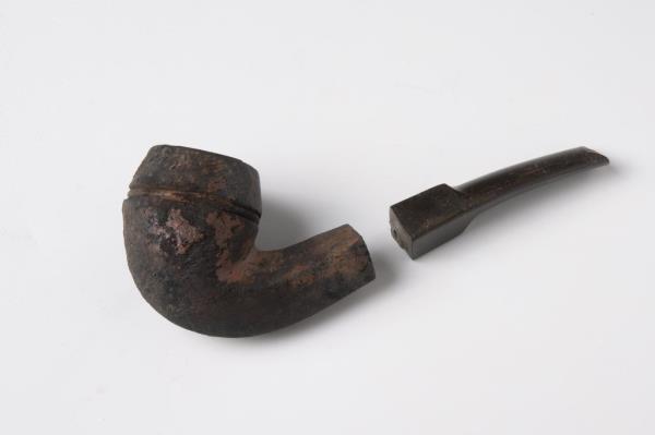 Pictures published by INRAP show archaeologists found medical bottles, combs, buttons and even a smoking pipe during the dig.