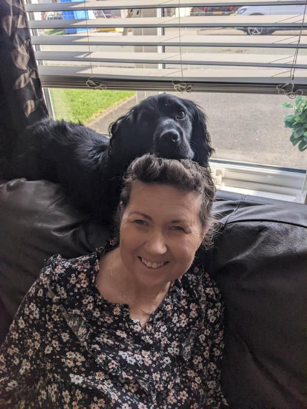 Kerry Pugh with a dog. 