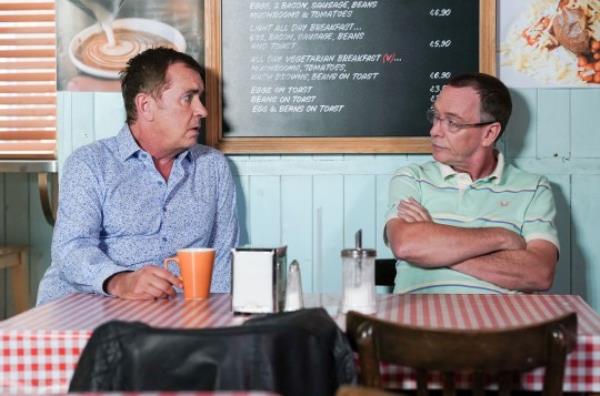 Alfie and Ian have a heart to heart in the café in EastEnders