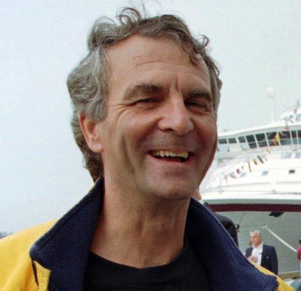 CORRECTS SPELLING TO HENRI, INSTEAD OF HENRY - FILE - Commander Paul-Henri Nargeolet laughs, at Black Falcon Pier in Boston on Sept. 1, 1996. The missing submersible Titan imploded near the wreckage of the Titanic, killing all five people aboard, Shahzada Dawood, Suleman Dawood, Paul-Henri Nargeolet, Stockton Rush, and Hamish Harding, the U.S. Coast Guard announced, Thursday, June 22, 2023. (AP Photo/Jim Rogash, File)