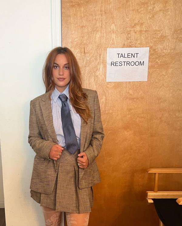 Hannah Berner, 33, wearing a necktie.