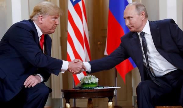 Trump and Putin shaking hands.