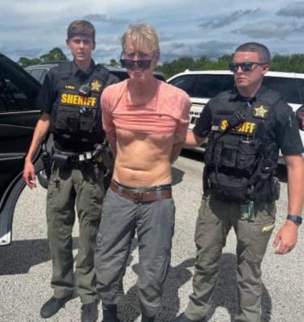 Ryan Wesley Routh pictured moments after his arrest on Sunday.
