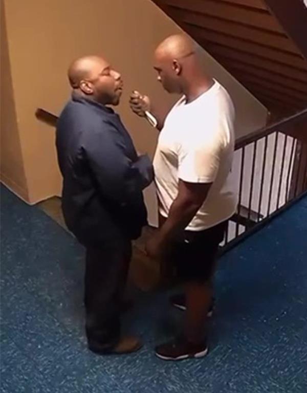 47-year-old school bus driver Bladimy Mathurin, marches out of the apartment brandishing a pair of scissors and angrily co<em></em>nfronts the neighbor, the video shows.