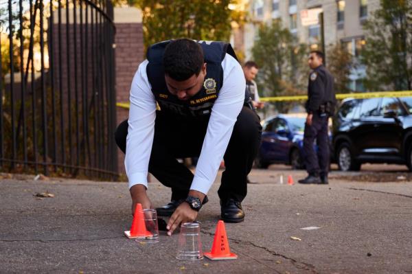 investigate the area near 301 West 145th St. after a 7-year old child was shot on Monday, November 11, 2024 in New York, N.Y.