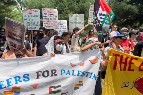Supporters of Palestine allegedly organized by the group Within Our Lifetime protest outside St. Mary's Park during an Alexandria Ocasio-Cortez, Bernie Sanders, and Jamaal Bowman rally and canvass kick-off on the weekend before the New York Democratic Primary on JUNE 22, 2024 in the Bronx borough of New York City
