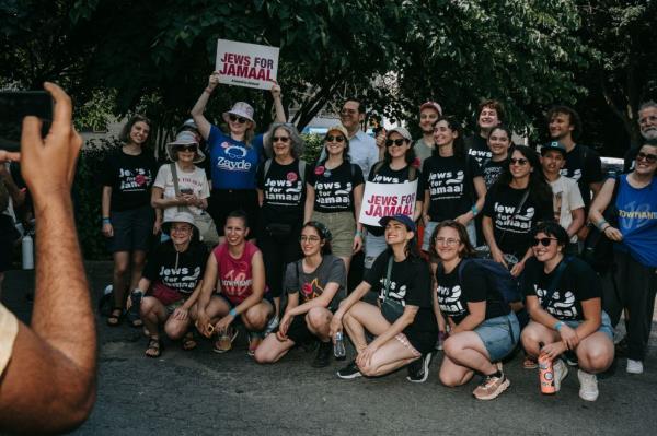 People wearing Jews for Jamaal t-shirts pose for a photograph during a rally with co<em></em>ngresswoman Alexandria Ocasio-Cortez of New York, Senator Bernie Sanders of Vermont in support of co<em></em>ngressman Jamaal Bowman in his primary race in the Bronx borough of New York, USA, 22 June 2024