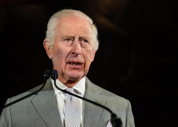 King Charles III speaking into a microphone at the inaugural King's Foundation Charity Awards at St. James's Palace in London.